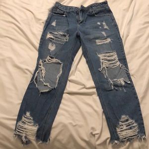 Super distressed boyfriend jeans